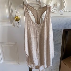 Tank top with high slits on the side. Joah Brown.